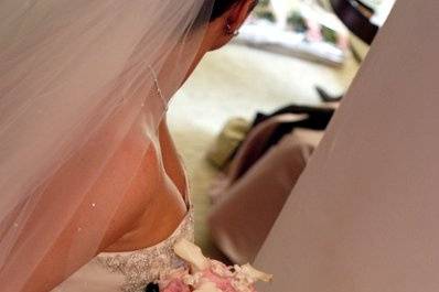 Bride holding pink and white bouquet