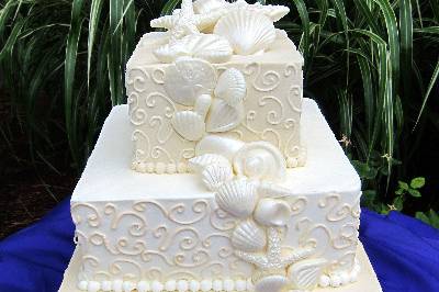 Textured square cake with ascending flowers