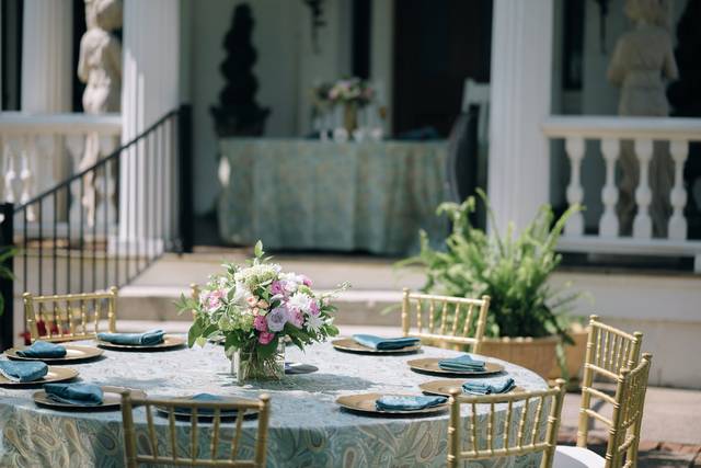 Mansion front patio with tables