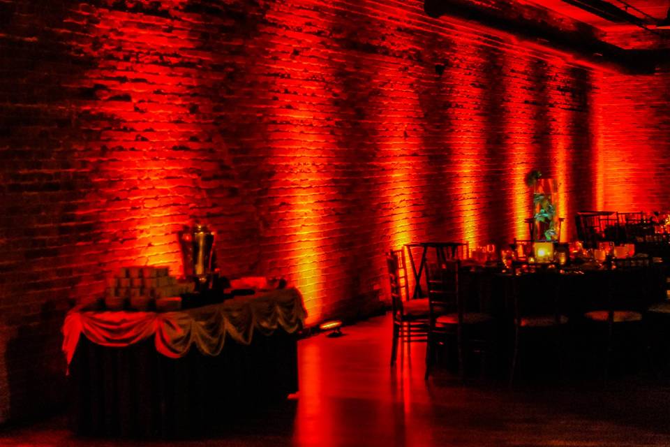Uplighting Brick in a loft style venue located in the West Loop of Chicago - 451. Designed and provided by Boom Entertainment