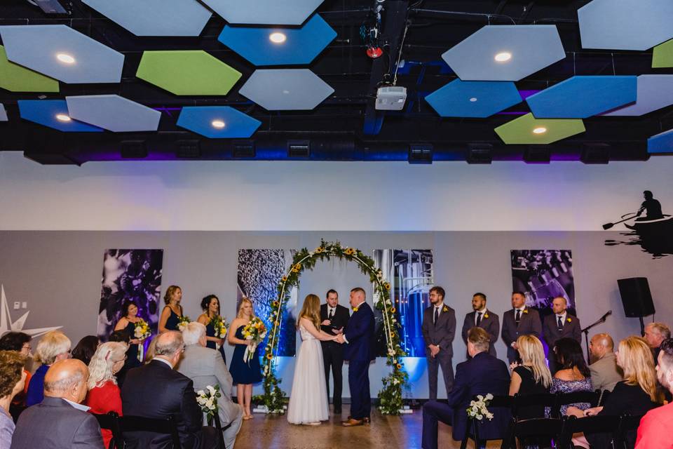 Ceremony in colorful event space - Sam Nappi Photography
