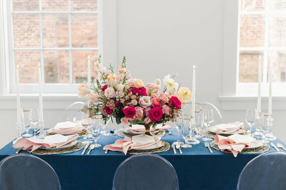 Blue table and floral centerpiece