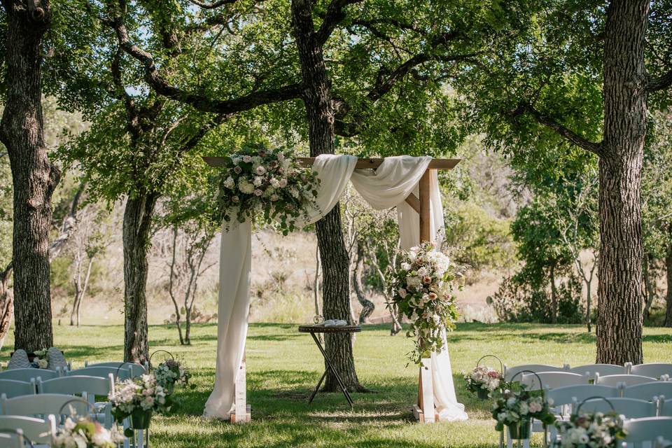 Arch and chair bouquets