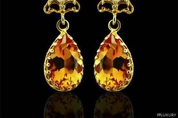 Vintage Style Citrine Earrings 14K Yellow Goldhttp://www.orospot.com/product/e313ma/vintage-style-citrine-earrings-14k-yellow-gold.aspxSKU: E313MA$369.00This classic vintage design is a timeless creation. Hanging earring with double twisted wires and the citrines (approx. 5cttw both) set in a gallery prong setting. Earrings are 14 mm tall without bail and and 12 mm wide (5/10 X 4/10 inch) and are made of 14k yellow gold. This Style is also avaliable in white gold and variety of different gems to pick from. We offer Citrine, Blue Topaz, Garnet and Peridot, so you can pick stone you love the most.
