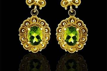 Vintage Style Oval Jade Jadeite 14K Yellow Gold Earringshttp://www.orospot.com/product/e3008ma/vintage-style-oval-jade-jadeite-14k-yellow-gold-earrings.aspxSKU: E3008MA $479.00Traditional handmade vintage style oval jade in 14kt yellow gold with oriental seed pearls strung on a gold wire, and wire backs. Earrings are 29mm tall and 17.5mm wide (1.1 X 0.7inch).