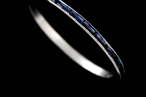 950 Platinum Super Thin 0.76CT French Cut Baguette Blue Sapphires Eternity Wedding Band 1.3 mm Widehttp://www.orospot.com/product/b055bg85mh/950-platinum-super-thin-0-76ct-french-cut-baguette-blue-sapphires-eternity-wedding-band-1-3-mm-wide.aspxSKU: B055BG85MH$1,129.00This super thin eternity wedding band is a 950 platinum piece. The height of this band is 1.45mm and the width is 1.3mm. This wedding band contains 0.76CT natural french cut baguette blue sapphires channel set all around the shank. The edges are milgrained and this band contains high polish finish. Approximate Band Weight: 1.2 grams (ring size 6) This wedding band is available in all sizes, please contact us for your size preference. Please allow 2-3 weeks to complete the order.
