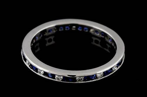 Classic Channel Set 0.73cttw French Cut Baguette Sapphires and Round Diamonds Eternity Wedding Bandhttp://www.orospot.com/product/b544214mh/classic-channel-set-0-73cttw-french-cut-baguette-sapphires-and-round-diamonds-eternity-wedding-band.aspxSKU: B544214MH $1,699.00This beautiful classic style eternity wedding band is a 950 platinum piece. The height of this band is 1.65mm and the width is 2.2mm. This wedding band contains 0.60CT french cut baguette natural blue sapphires and 0.13CT round shape natural diamonds channel set all around the shank. The edges are milgrained and sides are high polished. Approximate Band Weight: 2.1 grams (ring size 4.75) This wedding band is available in all sizes, please contact us for your size preference. Please allow 2-3 weeks to complete the order.