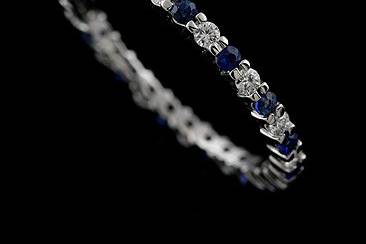 Diamond Sapphire Prong Set Eternity 14K White Gold Wedding Band 1.8 mm Widehttp://www.orospot.com/product/b1054ven/diamond-sapphire-prong-set-eternity-14k-white-gold-wedding-band-1-8-mm-wide.aspxSKU: B1054VEN $799.00This modern style 14k white gold band contains an alternating pattern of white, brilliant cut, round diamonds G-SI1 quality, approx. 34cttw and blue round sapphires approx. .34cttw. (the diamond and sapphire weight will be different for different finger size). The height and width of this band is approx. 1.8mm, sides are high polished. Elegant ring is available in all sizes, please contact us for your size preference. Please allow 2- 3 weeks to complete the order