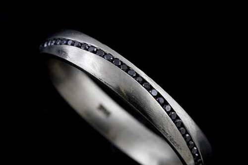 Round Cut Channel Set Black Diamonds 14k White Gold Satin Finish Wedding Band Ring 3 mm Widehttp://www.orospot.com/product/b1057wppb/round-cut-channel-set-black-diamonds-14k-white-gold-satin-finish-wedding-band-ring-3-mm-wide.aspxSKU: B1057WPPB $599.00This satin finish wedding band is a 14k white gold pieces. There are round cut, channel set black diamonds (approx .30cttw) securely set all around wedding bend. Ring is 3mm wide, 1.6mm tall, weights approx 2.7g (in size 6) and is available in all finger sizes, please contact us for your size preference.