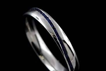 Round Cut Channel Set Sapphire Platinum Wedding Band Ring 3 mm Widehttp://www.orospot.com/product/b1057ven/round-cut-channel-set-sapphire-platinum-wedding-band-ring-3-mm-wide.aspxSKU: B1057VEN$999.00Men's matching wedding band is available SKU #B1058VENClassic, wedding band is made of platinum 950. There are round cut, channel set sapphires ( approx .31ct) securely set all around wedding bend. Ring is 3mm wide, 1.6mm tall and is available in all finger sizes, please contact us for your size preference.