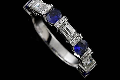 Round Blue Sapphire Baguette And Round Diamonds Bar Pave Set Half Way Wedding Bandhttp://www.orospot.com/product/b2093ven/round-blue-sapphire-baguette-and-round-diamonds-bar-pave-set-half-way-wedding-band.aspxSKU: B2093VEN $2,999.00This unique, half way wedding band is a platinum pieces. Contains four (3.5 mm), natural blue sapphires apprrox .60ct and four baguette diamonds (4 x 2.5 mm, approx .60ct, G-VS quality), bar set as well. There are also small, pave set diamonds (approx. 0.12ct, G-VS quality). Width of the top is 3.5 mm, height 3 mm. Bottom shank is 2.7 mm wide and 1.4 mm tall. This exclusive ring is available in sizes from 4 to 8. Please allow 2-3 weeks to complete the order.