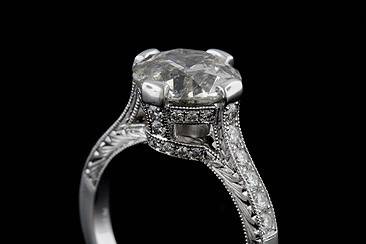 Art Deco Style Engraved Pave Platinum Engagement Ring Mountinghttp://www.orospot.com/product/r1036ven/art-deco-style-engraved-pave-platinum-engagement-ring-mounting.aspxSKU: R1036VEN$2,499.00Hand Engraved Platinum Engagement Ring Mounting is Pictured with 3ct Round Diamond Stone and 42 Side Diamonds (G - VS Quality Approx. 1/2Cttw) Smaller Diamonds are set on prongs, under bezel and the shank. This Magnificent Art Deco Replica Ring can be ordered for any Size or Shape of the Center Stone. Center Stone is NOT included but can be found in our Diamond Inventory. If you are interested in this mounting but have your own center stone, please contact us and provide the stone measurements. We will create this ring just for your stone. PLEASE ALLOW 2- 3 WEEKS TO COMPLETE THIS RING