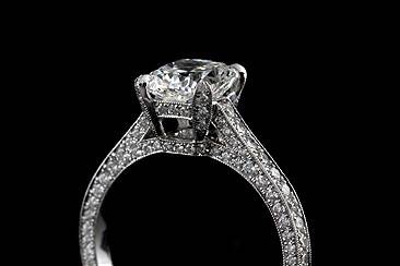 Diamond Cushion Forever Brilliant Moissanite Micro Pave Vintage Style Engagement Ring 18k White Goldhttp://www.orospot.com/product/r1046venfb/diamond-cushion-forever-brilliant-moissanite-micro-pave-vintage-style-engagement-ring-18k-white-gold.aspxSKU: R1046VENFB$3,299.00This beautiful diamond engagement ring is made of 18k white gold. Ring contains approx. 140, round cut pave set diamonds .80cttw, G-VS quality (set under microscope) 3/4 way on the shank and under center stone. Whole ring is beautifully milgrained on the edges. Cushion forever brilliant moissanite (2ct, 7mm) is securely set in four, claw prongs. Width of the shank is 2.2 mm wide. Ring is also available in platinum 950 for additional $300. Please allow 2-3 weeks to complete the order.
