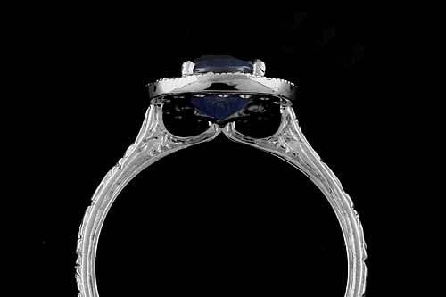 Diamond Round Blue Sapphire Engraved Vintage Style Halo Engagement Ringhttp://www.orospot.com/product/r1071vens/diamond-round-blue-sapphire-engraved-vintage-style-halo-engagement-ring.aspxSKU: R1071VENS$769.00This beautiful halo engagement ring is made of 14k white gold. Ring contains round cut, blue sapphire center stone (6mm, approx 1ctww.) and small diamonds, (.16cttw, G-SI1 quality) prong set all around. Engraved shank is 1.8mm wide and 1.4mm tall. Vintage style ring is available in sizes from 4 to 8, please contact us for more information. This style is also available in a variety of other gems such as: Citrine, Blue Topaz, Amethyst, Garnet and Peridot. Please contact us if you are interested in any of these options. Please allow 2-3 weeks to complete the order.