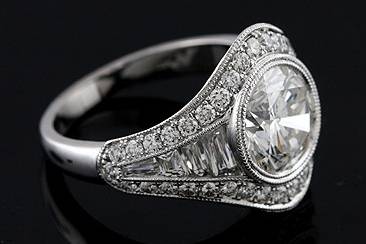 French Cut Diamond Channel And Pave Set Platinum Engagement Ring Mountinghttp://www.orospot.com/product/r1050ven/french-cut-diamond-channel-and-pave-set-platinum-engagement-ring-mounting.aspxSKU: R1050VEN$4,199.00This beautiful engagement ring is made of platinum 950. Center stone in NOT included ( pictured with 2.3 ct round cut diamond) but can be ordered separately from our diamond inventory. Mounting contains eights french cut baguettes channel set (four of them on each side) .65ct, G-V quality, and approx 44 small, round cut diamonds .60ct, G-VS quality pave set. Whole ring is milgrained on the edges and high polished. Diamond ring is 2.4mm wide, 1.8mm tall on the bottom and 5mm tall, 15mm wide on the top. This unique ring can be ordered in all finger sizes, please contact us for your size preference. Please allow 2-3 weeks to complete the order.