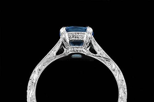 Platinum 950 Hand Engraved Vintage Style Cushion Shape Blue Topaz Engagement Ringhttp://www.orospot.com/product/r2028vent/platinum-950-hand-engraved-vintage-style-cushion-shape-blue-topaz-engagement-ring.aspxSKU: R2028VENT $1,249.00This platinum ring contains 6.5 mm cushion shape blue topaz. Whole ring is beautifully hand engraved and milgrain on the edges. Width of the shank is 2 mm. Ring is available in sizes from 4 to 8, please allow 2-3 weeks to complete the order.