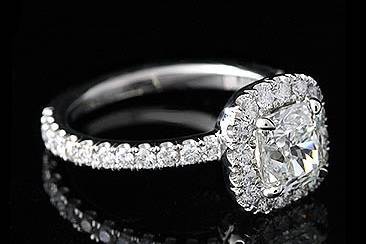 Platinum Cushion Diamond Engagement Ring Mountinghttp://www.orospot.com/product/r1008ven/platinum-cushion-diamond-engagement-ring-mounting.aspxSKU: R1008VEN$2,869.00This elegant diamond ring is made of platinum and contains round cut diamonds, cut down micro pave set all around cushion center stone and on the shank. (G-VS quality, 1cttw). Ring is available in all sizes. Center stone is not included in the price. Please contact us for center stone Information. (Pictured ring with 1.5Ct center stone)