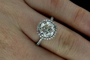 3CT Forever Brilliant Moissanite Cut Down Micropave Diamond Solid 14k Gold Halo Engagement Ringhttp://www.orospot.com/product/r2017venfb/3ct-forever-brilliant-moissanite-cut-down-micropave-diamond-solid-14k-gold-halo-engagement-ring.aspxSKU: R2017VENFB $2,499.00This beautiful diamond engagement ring is made of solid 14K white gold and the center stone is 3CT Round Shape Forever Brilliant Moissanite. This engagement ring contains round, cut down micro-pave set diamonds all around center stone and 3/4 way down on the shank (approx 0.32ctttw, G-VS quality). The width and the height of the shank is 1.6 mm. This beautiful halo ring is available in all finger sizes, please contact us for your size preference. Please allow 2 -3 weeks to complete the order.