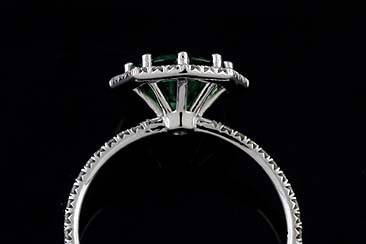14K White Gold Cut Down Micro Pave Diamond Green Tourmaline Octagon Halo Engagement Ringhttp://www.orospot.com/product/r1098ven/14k-white-gold-cut-down-micro-pave-diamond-green-tourmaline-octagon-halo-engagement-ring.aspxSKU: R1098VEN$1,369.00This beautiful engagement ring is made of 14k white gold. Ring contains round cut, green tourmaline center stone (approx 1.73ct) securely set in eight prongs. There are diamonds (.34cttw, G-VS quality) cut down micro pave set all around center stone on the octagon shaped halo and half way on the shank. Height of the shank is 1.4 mm, ring is only 1.5 mm wide, the center stone is set above the finger 6 mm. Ring was designed to accommodate 7.9 mm center stone and is also available in variety of other gemstones. Please contact us if you are interested in any of these options. Please allow 2-3 wees to complete the order