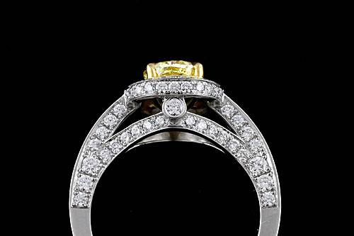 Modern Two Tone Platinum 18k Yellow Gold Pave Set Diamond Halo Engagement Ringhttp://www.orospot.com/product/r2032ven/modern-two-tone-platinum-18k-yellow-gold-pave-set-diamond-halo-engagement-ring.aspxSKU: R2032VEN$3,899.00This two tone (platinum and 18k yellow gold) ring was pictured with 1.5ct natural fancy yellow, cushion cut diamond. The center stone is not included with the price but can be ordered separately from our diamond inventory. Ring can be made to fit any shape/size of the center stone. There is over 100 diamonds, pave and two of them bezel set around the center stone, on the shank and on the bridge under the stone (approx 1.22 cttw, G-VS quality). Ring is 11 mm wide on the top (please note that the width depends of the size of the center stone), stone is set above the finger 7 mm. Shank is 2 mm wide and 1.8 mm tall on bottom. This outstanding, modern ring is available in all finger sizes, please allow 3-4 weeks to complete the order.