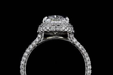 Pear Shape Diamond Cut Down Micro Pave Platinum Engagement Ring Mountinghttp://www.orospot.com/product/r2009ven/pear-shape-diamond-cut-down-micro-pave-platinum-engagement-ring-mounting.aspxSKU: R2009VEN $3,229.00This elegant double halo style engagement ring is made of platinum 950. Setting was designed by Eternal and created to accommodate pear shape center stone 2ct (stone is NOT included but can be ordered separately from our diamond inventory) but can be made to fit any size/ shape of the stone. Ring contains three rows of cut down micropave set diamonds, 3/4 way down on the shank, and two row of diamonds all around center stone (.75cttw, G-VS quality). Width of the shank is 2.6 mm, height 1.8 mm, center stone is set above the finger 5.5 mm. This exceptional ring can be ordered in all finger sizes, please contact us for your size preference. Please allow 3-4 weeks to complete the order