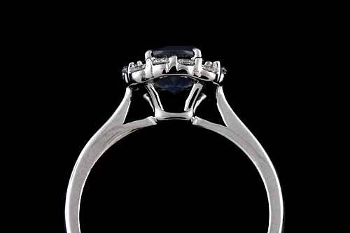 Round Blue Sapphire Diamond Cushion Shape Halo Modern Style Engagement Ring 14k White Goldhttp://www.orospot.com/product/r2041ven/round-blue-sapphire-diamond-cushion-shape-halo-modern-style-engagement-ring-14k-white-gold.aspxSKU: R2041VEN $819.00This beautiful halo style engagement ring is made of 14k white gold. Contains round, blue sapphire center stone (6 mm, approx 1ct.). There are diamonds (.26cttw, G-SI1 quality) prong set all around gemstone. Center stone is set above the finger 7 mm, shank is 1.3 mm tall and 2.3 mm wide, top of the ring is 9 mm in diameter. Ring was designed to accommodate 6 mm center stone and is also available in variety of other gemstones. Please contact us if you are interested in any of these options. Ring Weigh: 3.4g (in a size 6) Please allow 1-2 weeks to complete the order.