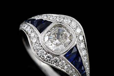 French Cut Sapphire Channel Set And Diamond Platinum Engagement Ring Mountinghttp://www.orospot.com/product/r1051ven/french-cut-sapphire-channel-set-and-diamond-platinum-engagement-ring-mounting.aspxSKU: R1051VEN$2,699.00This beautiful engagement ring is made of platinum 950. Center stone in NOT included ( pictured with .70ct cushion cut diamond) but can be ordered separately from our diamond inventory. Mounting contains eights french cut sapphires channel set (four of them on each side) .45ct, and approx 50 small, round cut diamonds .50ct, G-VS quality pave set. Whole ring is milgrained on the edges and high polished. Diamond ring is 1.9mm wide, 1.5mm tall on the bottom and 5mm tall, 12mm wide on the top. This unique ring can be ordered in all finger sizes, please contact us for your size preference. Please allow 2-3 weeks to complete the order.