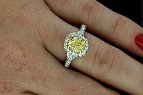 Modern Two Tone Platinum 18k Yellow Gold Pave Set Diamond Halo Engagement Ringhttp://www.orospot.com/product/r2032ven/modern-two-tone-platinum-18k-yellow-gold-pave-set-diamond-halo-engagement-ring.aspxSKU: R2032VEN $3,899.00This two tone (platinum and 18k yellow gold) ring was pictured with 1.5ct natural fancy yellow, cushion cut diamond. The center stone is not included with the price but can be ordered separately from our diamond inventory. Ring can be made to fit any shape/size of the center stone. There is over 100 diamonds, pave and two of them bezel set around the center stone, on the shank and on the bridge under the stone (approx 1.22 cttw, G-VS quality). Ring is 11 mm wide on the top (please note that the width depends of the size of the center stone), stone is set above the finger 7 mm. Shank is 2 mm wide and 1.8 mm tall on bottom. This outstanding, modern ring is available in all finger sizes, please allow 3-4 weeks to complete the order.