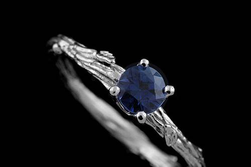 Organic Design Vintage Style 5mm Blue Sapphire 14K Gold Engagement Ringhttp://www.orospot.com/product/r1060venb/organic-design-vintage-style-5mm-blue-sapphire-14k-gold-engagement-ring.aspxSKU: R1060VENB$639.00Organic design, solid 14k gold ring contains round cut, blue sapphire approx. 0.60ct. (5mm). Beautifully engraved shank (2.5 mm wide, 1.9 mm tall) with leaves accent makes this ring original and unique. Pictured matching wedding band is NOT included with the ring, but can be ordered for additional $299.