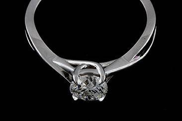 Classic Solid 14K White Gold Engagement Ring Mountinghttp://www.orospot.com/product/r1095ven/classic-solid-14k-white-gold-engagement-ring-mounting.aspxSKU: R1095VEN$419.00Center Stone: NOT Included. (This ring mounting was designed for a 5.5mm stone but can accommodate most shapes and sizes of the center stone. Please note that center stone sizes smaller and larger than 5.5mm will cost $150 extra.) Shank Width: 3.5mm at the top of the shank. 1.3mm at the bottom of the shank. Shank Height: 4.5mm at the center stone. Modern style engagement ring is available in all finger sizes, please contact us for your size preference. Please allow 10 business days to complete the order.