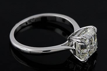 Platinum Solitaire Asscher Cut Diamond Engagement Ring Mountinghttp://www.orospot.com/product/r1038ven/platinum-solitaire-asscher-cut-diamond-engagement-ring-mounting.aspxSKU: R1038VEN$999.00This elegant platinum solitaire engagement ring is pictured with one 3Ct Asscher cut diamond (The center stone is not included with the price) set in double, delicate, prongs. The shank is rounded and tapered toward the center stone. This ring can be created with any size or shape of center stone. If you are interested, you can purchase mounting only or complete ring (You can find diamond in our diamond inventory). Please contact us for more details. Please allow 2 weeks to complete the order