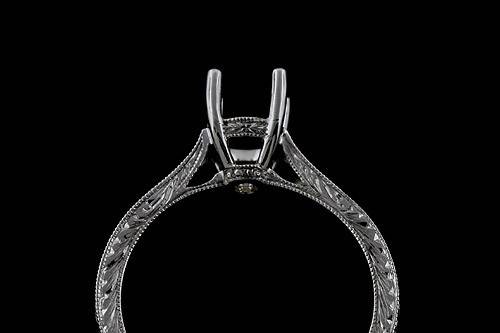 14k White Gold Engraved Vintage Antique Reproduction Ring Setting Mountinghttp://www.orospot.com/product/r2031ven/14k-white-gold-engraved-vintage-antique-reproduction-ring-setting-mounting.aspxSKU: R2031VEN$399.00This 14k gold ring was created to accommodate round center stone from 5.5 to 6mm but can designed to fit any shape/size of the center stone. If you are interested in this mounting and have your own center stone, please contact us and provide the stone shape and measurements, we will create this ring just for your stone for additional $300. Whole ring is beautifully engraved and milgrain on the edges. Width of the shank is 2 mm, height approx 1.9 mm on the thickest part. Pictured matching wedding band is not included with the price but is available for additional $269