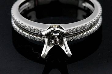 Modern Style Platinum .60ct Prong Set Diamond Engagement Rng Mounting.http://www.orospot.com/product/bpyymh2/modern-style-platinum-60ct-prong-set-diamond-engagement-rng-mounting.aspxSKU: BPYYMH2$2,499.00This Mounting is Made of Platinum 950. Contains 80 Prong Set Diamond .60cttw. and was Created to Accommodate Round Center Stone, but can be adjusted to fit any shape or size of stone. Mounting Dimensions: Width: 3.2 mm Height on the top: 2.8 mm Thickness on the bottom: 1.3 mm All Sizes are Available (Please Contact Us for your size Preference.)