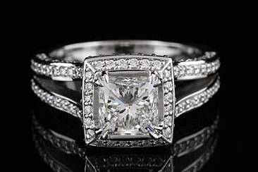 GIA Certified Princess Cut 3cttw Diamond Engagement Ring 18K White Goldhttp://www.orospot.com/product/r1017ven/gia-certified-princess-cut-3cttw-diamond-engagement-ring-18k-white-gold.aspxSKU: R1017VEN$18,450.00Diamond princess cut engagement ring is made of 18K white gold and contains pin-point, round cut diamonds (G-VS1 quality, .96cttw). Center Stone Information: LAB: GIA Carat Weight : 2.10 ct Color: I Clarity: VS2 Polish: Excellent Symmetry: Very Good Fluorescence: None Ring is available in all sizes for more information please contact us.