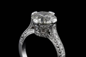 Art Deco Style Engraved Pave Platinum Engagement Ring Mountinghttp://www.orospot.com/product/r1036ven/art-deco-style-engraved-pave-platinum-engagement-ring-mounting.aspxSKU: R1036VEN $2,499.00Hand Engraved Platinum Engagement Ring Mounting is Pictured with 3ct Round Diamond Stone and 42 Side Diamonds (G - VS Quality Approx. 1/2Cttw) Smaller Diamonds are set on prongs, under bezel and the shank. This Magnificent Art Deco Replica Ring can be ordered for any Size or Shape of the Center Stone. Center Stone is NOT included but can be found in our Diamond Inventory. If you are interested in this mounting but have your own center stone, please contact us and provide the stone measurements. We will create this ring just for your stone. PLEASE ALLOW 2- 3 WEEKS TO COMPLETE THIS RING