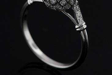 Design Diamond Pave Set Vintage Style 14k White Gold Engagement Ringhttp://www.orospot.com/product/r1062ven/design-diamond-pave-set-vintage-style-14k-white-gold-engagement-ring.aspxSKU: R1062VEN$2,499.00This design, antique style engagement ring is made of 14k white gold. Ring is securely set with 46 round diamonds (.31Cttw, G-VS quality). There are diamonds all around center stone, pave and burnish set on the basket and six of them on the shank. Ring contains round cut, diamond center stone (G-H color, SI1-SI2 clarity, .50cttw). This unique, vintage style ring can be ordered in all finger sizes, please contact us for your size preference. Please allow 2-3 weeks to complete the order.