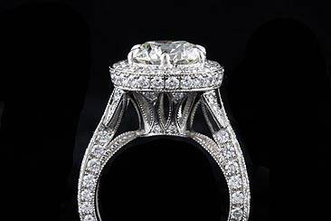 Diamond Platinum Vintage Style Micro Pave Engagement Ring Mountinghttp://www.orospot.com/product/r1015ven/diamond-platinum-vintage-style-micro-pave-engagement-ring-mounting.aspxSKU: R1015VEN$6,000.00Center stone is not included with the price (Pictured 3Ct round diamond). This exceptional ring can only be ordered as a custom request in all finger sizes. Ring is made of platinum and contains pave set, round cut diamonds (approx. 1.68ct, G-VS quality). For more information please contact us at sales@orospot.com