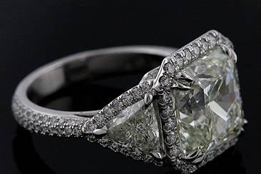 Platinum Diamond Engagement Ring Mountinghttp://www.orospot.com/product/r1042ven/platinum-diamond-engagement-ring-mounting.aspxSKU: R1042VEN$2,999.00This beautiful diamond engagement ring is made of platinum 950. Center stone and side diamonds are NOT included with the price (pictured with 3ct asscher cut diamond and two special cut diamonds .75ct) but can be ordered from our diamond inventory. Mounting contains small, round cut diamonds all around center stone ( .28ct, G-VS quality), three row of diamonds on the shank (. 36ct, G-VS quality) and around side diamonds (.21cttw, G-VS quality). This exceptional ring can only be ordered in all finger sizes, please contact us for your size preference. Mounting can be created fit any size/ shape center stone. Please allow 2-3 weeks to complete the order.