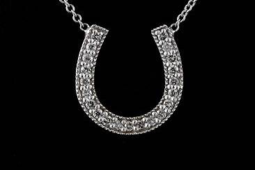 Diamond Lucky Horseshoe 14K White Gold Pendant Necklacehttp://www.orospot.com/product/p1307wpp/diamond-lucky-horseshoe-14k-white-gold-pendant-necklace.aspxSKU: P1307WPP$439.00Horseshoe is widely known symbol of good luck. Designer diamond horseshoe is made of 14k white gold and is 16mm tall (6/10inch) 13mm (5/10inch) wide. Pendant comes with 14K white gold chain (16 or 18 inch length, weights approx 1.1g), weights 1.4g (without chain). Necklace contains round cut diamonds and one princess cut diamond .24cttw, SI1 – SI2 clarity, G-H. This gold pendant was designed and created by P&P luxury and is also available in yellow and pink gold.