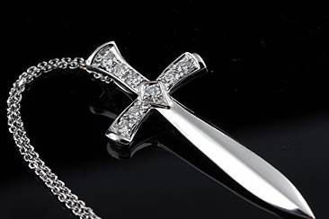 Diamond Cross Sword Pendant 14K White Goldhttp://www.orospot.com/product/p1150wpp/diamond-cross-sword-pendant-14k-white-gold.aspxSKU: P1150WPP$619.00The cross is one of the symbols, used by many religions, such as Christianity. In the end, the cross is the ultimate demonstration of God’s power. Sword symbolizes courage, action, strength, justice and protection. It is also the symbol of purification and is an emblem of St. Paul. This particular sword pendant is made of solid 14K white gold and contains 8 bead set round diamonds (.28cttw, G-H color, SI1-SI2 clarity) This 3D cross is high polish and rhodium plated. Necklace weights 3.1g and comes with 14k white gold chain (16 or 18 inch length, weights 1.1g). Cross is 40 mm tall,16 mm wide and is also available in yellow and pink gold.