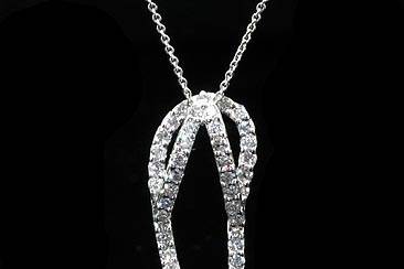 FINAL SALE 30% 0FF Diamond Open Heart Pendant Necklace 14K White Goldhttp://www.orospot.com/product/p1082wpp/final-sale-30-0ff-diamond-open-heart-pendant-necklace-14k-white-gold.aspxSKU: P1082WPP$524.00Heart has long been recognized across cultures as a symbol of love, charity, joy and compassion. It’s a perfect gift for beloved on Valentine's Day or Anniversary to express our love and adoration! Designer diamond open heart is made of 14k white gold and is 17 mm tall (7/10inch) 29mm (9/10inch) wide. Pendant comes with 14K white gold chain (16 or 18 inch) and weights 3.5g. Necklace contains round cut diamonds .37cttw, SI1 – SI2 clarity, G-H color.