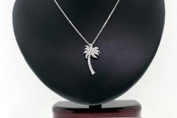 Diamond Cross Sword Pendant 14K White Goldhttp://www.orospot.com/product/p1150wpp/diamond-cross-sword-pendant-14k-white-gold.aspxSKU: P1150WPP$619.00The cross is one of the symbols, used by many religions, such as Christianity. In the end, the cross is the ultimate demonstration of God’s power. Sword symbolizes courage, action, strength, justice and protection. It is also the symbol of purification and is an emblem of St. Paul. This particular sword pendant is made of solid 14K white gold and contains 8 bead set round diamonds (.28cttw, G-H color, SI1-SI2 clarity) This 3D cross is high polish and rhodium plated. Necklace weights 3.1g and comes with 14k white gold chain (16 or 18 inch length, weights 1.1g). Cross is 40 mm tall,16 mm wide and is also available in yellow and pink gold.