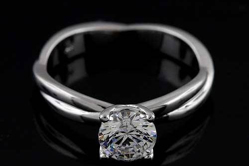 14K White Gold Cubic Zirconia Synthetic Stone Artistic Non Traditional Hand Created Engagement Ringhttp://www.orospot.com/product/r2054ven/14k-white-gold-cubic-zirconia-synthetic-stone-artistic-non-traditional-hand-created-engagement-ring.aspxSKU: R2054VEN $449.00This unique, hand created engagement ring is a 14k white gold pieces. Contains 6.5 mm cubic zirconia, synthetic stone. Width of the shank is 2 mm on the bottom and 3.3 mm at the top. Rings is 1.3 mm tall and the center stone is set above the finger 7 mm. This non traditional, organic ring is available in sizes form 4 to 8. Please allow 10 business days to complete the order. Matching wedding band is available under following link: http://www.orospot.com/product/b2099ven/artistic-non-traditional-hand-crafted-14k-white-gold-wedding-band.aspx