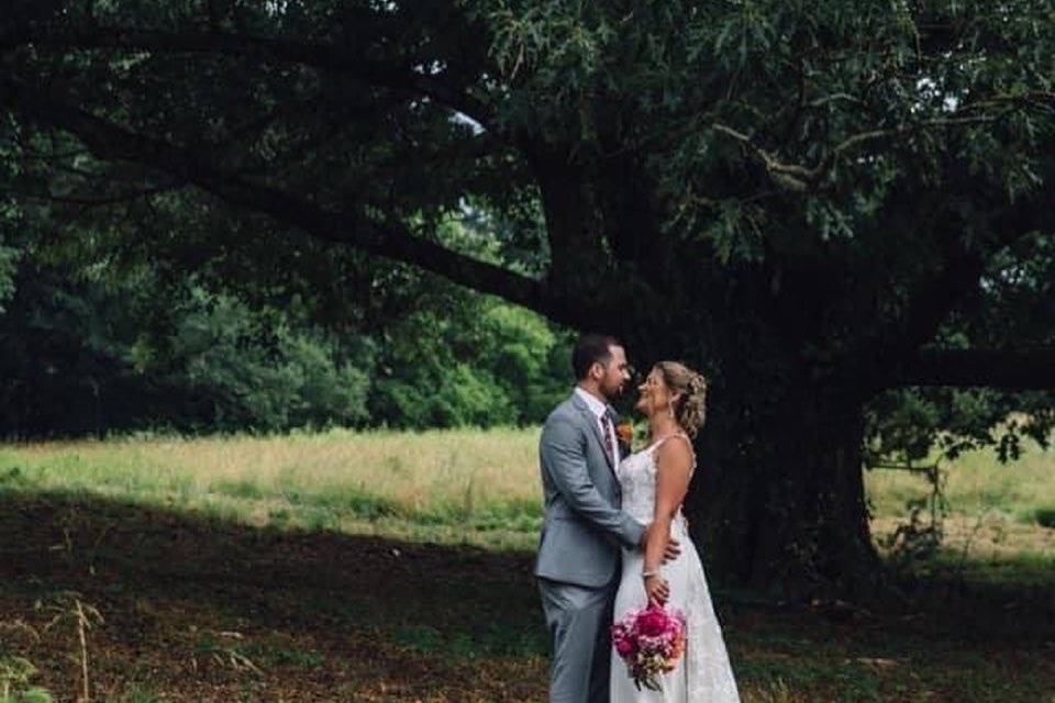 Couple with 100+ year old tree
