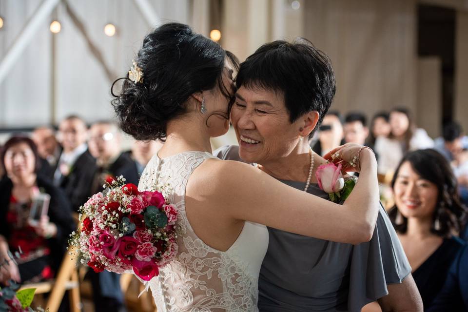 Mother and daughter hug