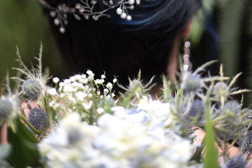 High bun with flower hair ornament