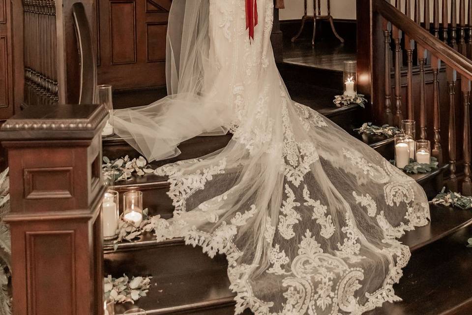 Bride on staircase downstairs