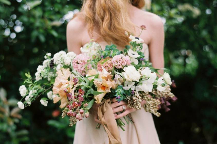 Lovely lady holding a bouquet