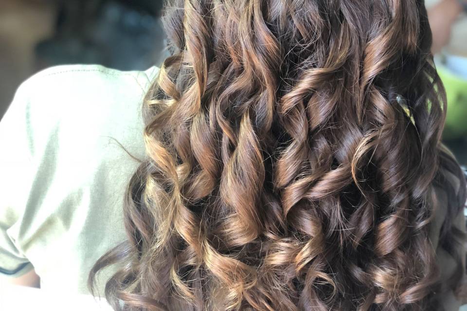 Braided half updo with curls