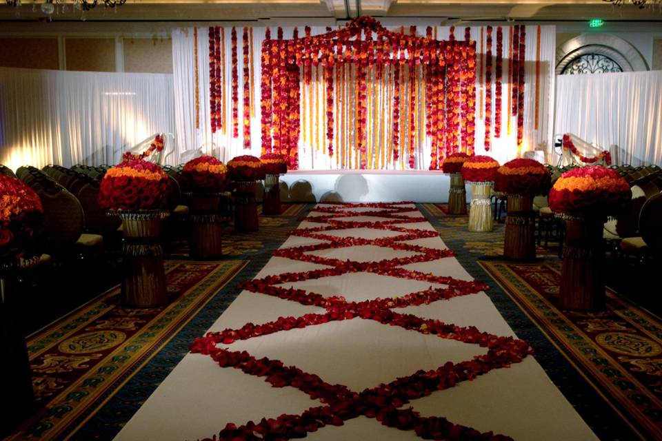 Red and orange theme indoor wedding